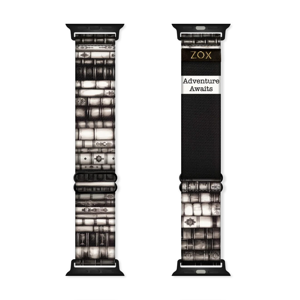 Apple Watchband render of the Adventure Awaits design, showing both the outside (left) and inside (right) of the band. The outer side on the left features a sepia-toned, vintage book pattern with detailed bindings. The inside on the right is solid black with the phrase 'Adventure Awaits' printed in bold white text. The ZOX logo is on a black tag sewn near the top.