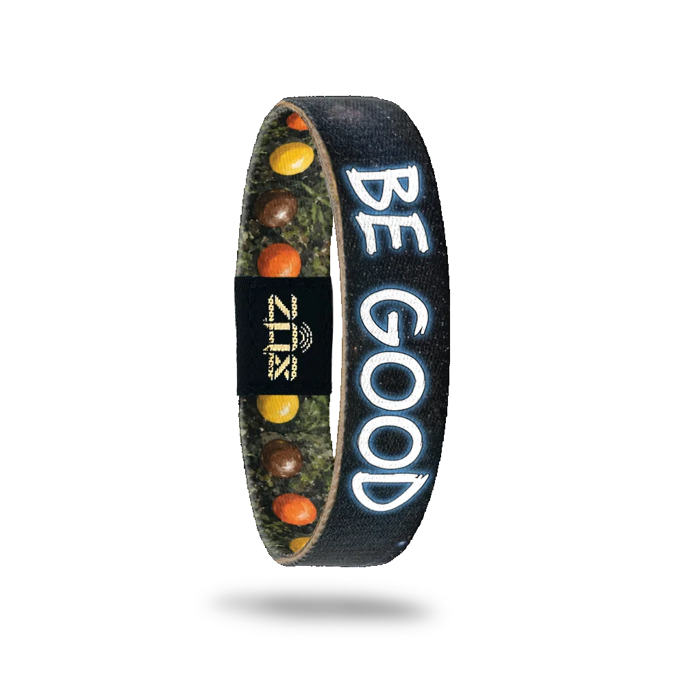 Inside of the Be Good bracelet, with the words Be Good above the candy and night sky print