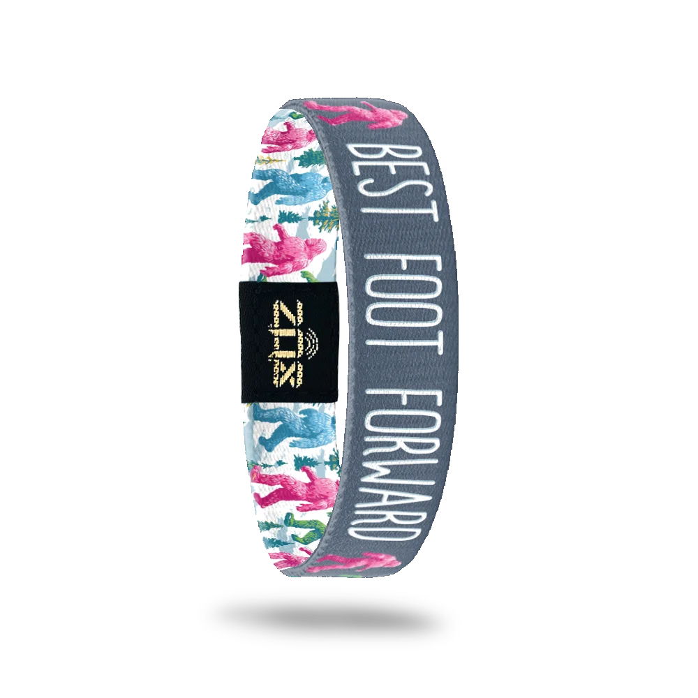 Inside of the Best Foot Forward bracelet, with the words Best Foot Forward across the colorful bigfoot print