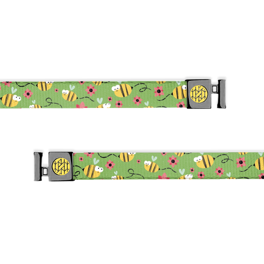 Bright green with cute bumble bees flying all over, surrounding pink flowers. Has gunmetal aglets with a yellow ZOX logo.