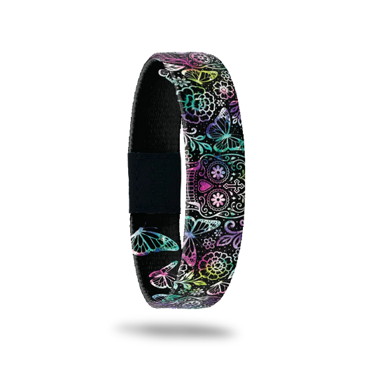 Don't Waste A Day bracelet showing sugar skulls and butterflies in bright pink, green and blue on black