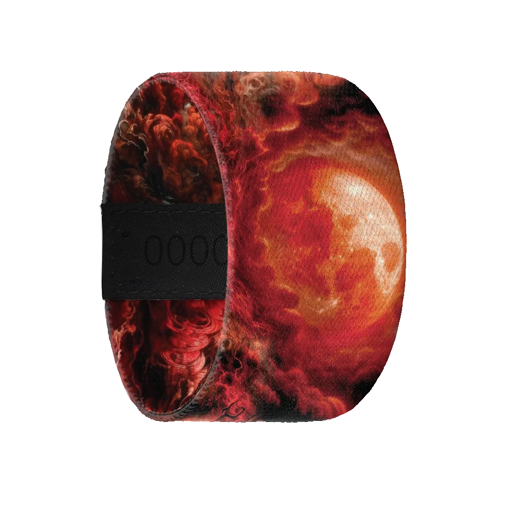 Do not purchase, this is a reward item. ZOX extra large strap with a design of the moon/sun. Colors are black, red and orange and the inside reads Embrace the Tempest. 