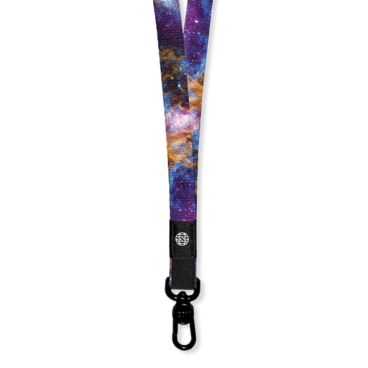 A nebula scene from space with purple, blue, orange, pink and white speckles. Inside is solid black and says Fighter