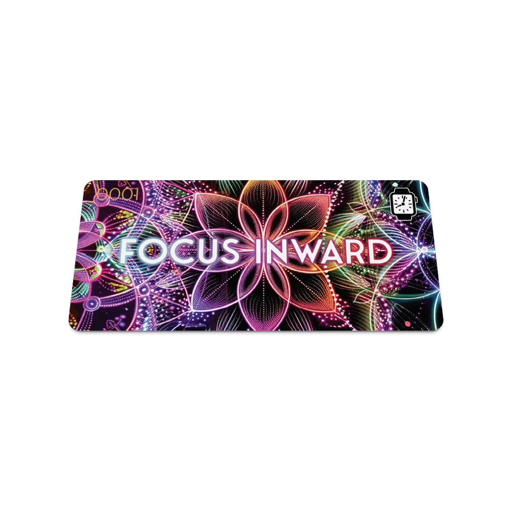 Product photo of the front of the collector’s card for Focus Inward. The design features a vibrant, multicolored geometric pattern with a large, glowing flower-like shape in the center. The phrase "FOCUS INWARD" is printed in bold white text across the center. The top left corner displays the number "0001" in gold, and a small watch icon is located in the top right corner.