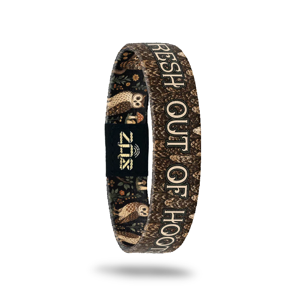 Inside of the Fresh Out Of Hoots bracelet, with the words Fresh Out Of Hoots across the woodland owl print