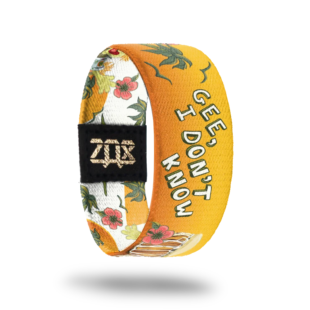 A vibrant bracelet that includes lush green vines, red flowers, and a cheerful yellow and orange gradient background. The phrase "Gee, I don't know" appears in bold white and green text on the yellow portion of the bracelet.