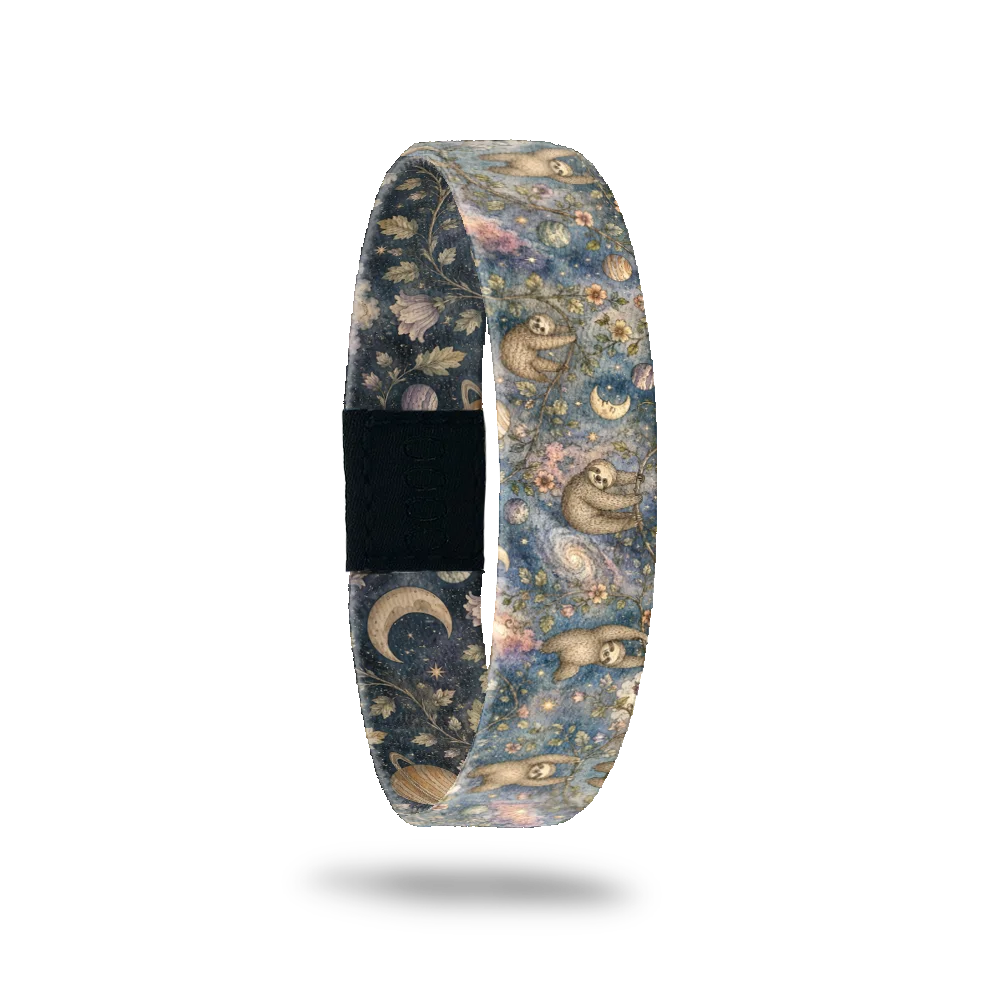 Getting There bracelet showing sloths hanging among flowers, stars and a crescent moon on dusky blue