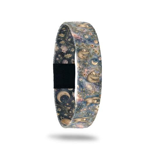 Getting There bracelet showing sloths hanging among flowers, stars and a crescent moon on dusky blue