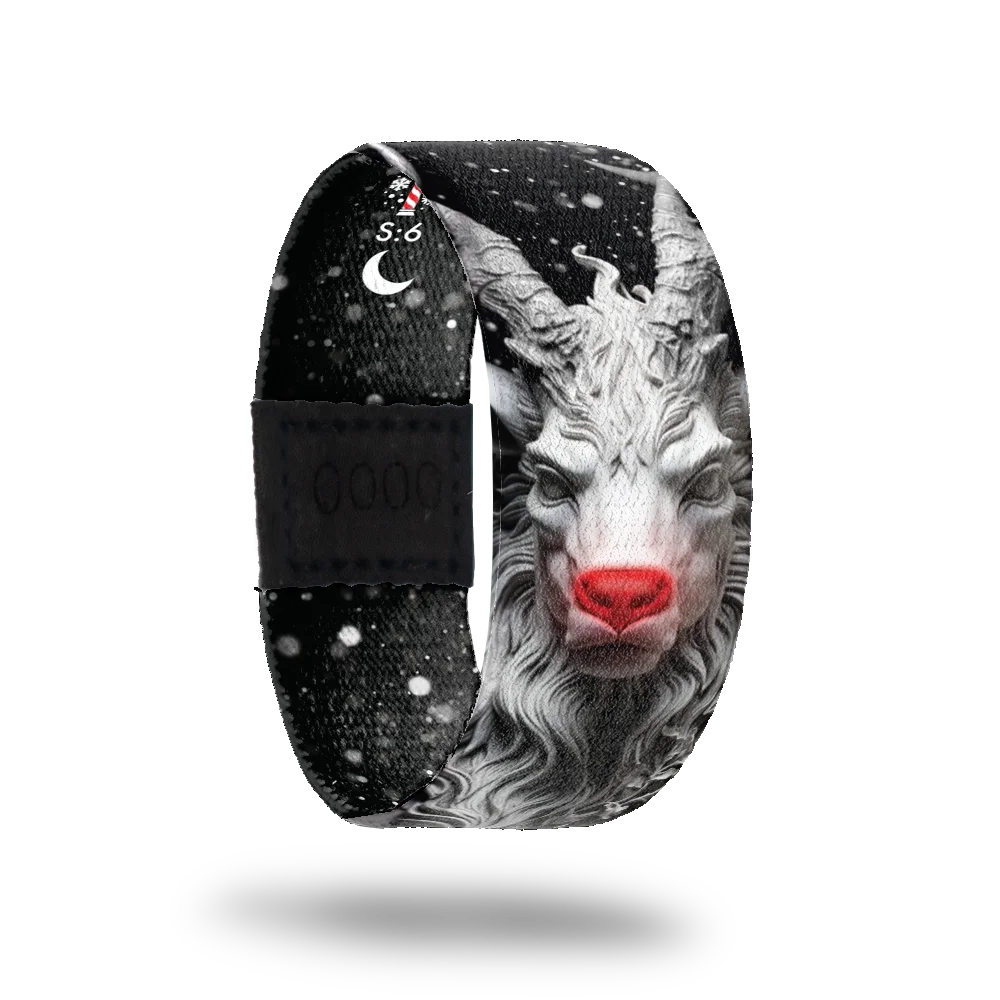 This is a reward, do not purchase. The base color is black and the image of a scary Rudolph in the snow. The entire design is black and white except for the glowing red nose. The inside says Illuminating Light. 