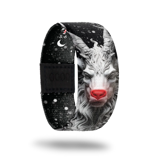 This is a reward, do not purchase. The base color is black and the image of a scary Rudolph in the snow. The entire design is black and white except for the glowing red nose. The inside says Illuminating Light. 