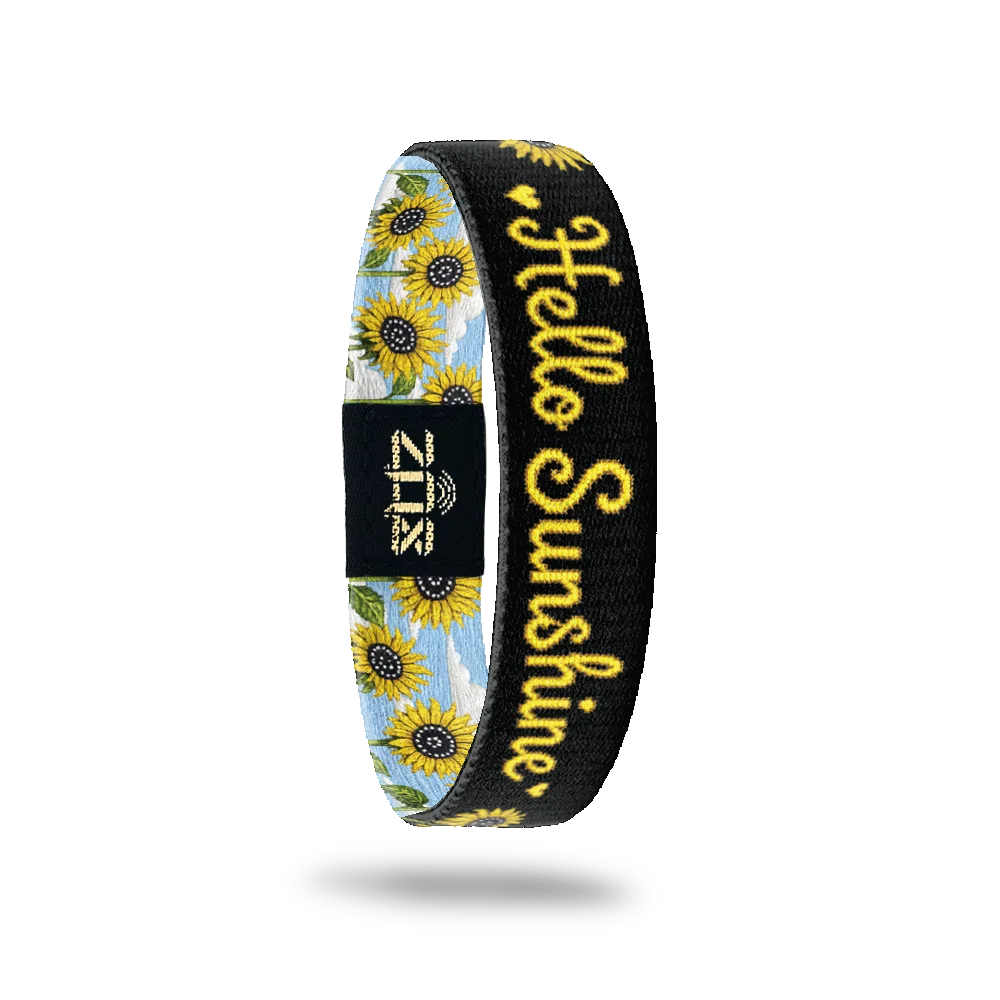 Inside of the Hello Sunshine bracelet, with the words Hello Sunshine across the sunflower print