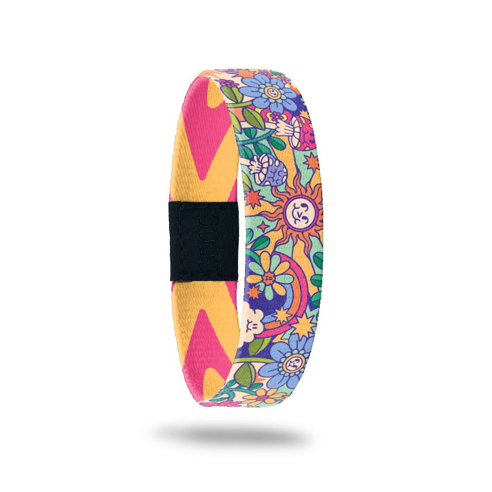 Wristband single with a very groovy, colorful, cartoon design. Lots of plants, flowers, smiling sun, mushrooms, clouds and rainbows all over. The inside is orange and blue geometric and says Look For Rainbows. This comes with a matching lapel pin and collector's box.  