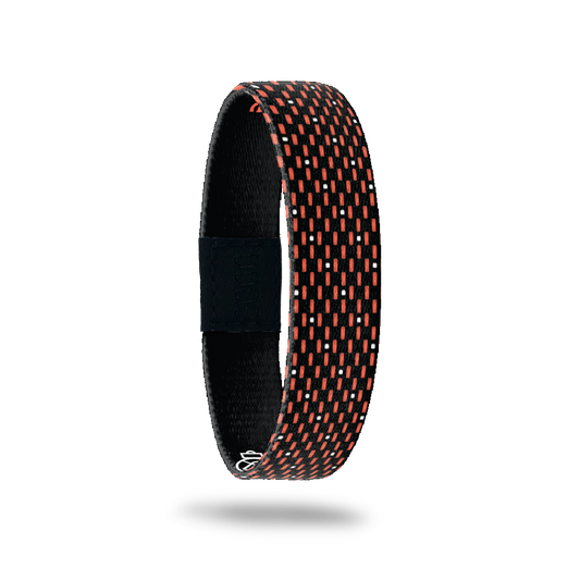 Outside Design of Make the Nevers Possible: black background with orange and white line and dot pattern