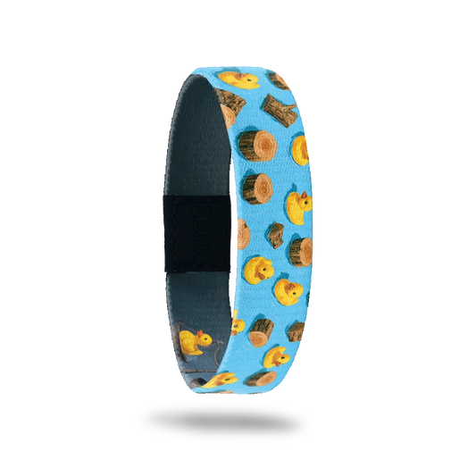 Made of Wood bracelet showing yellow rubber ducks and floating logs on bright blue water
