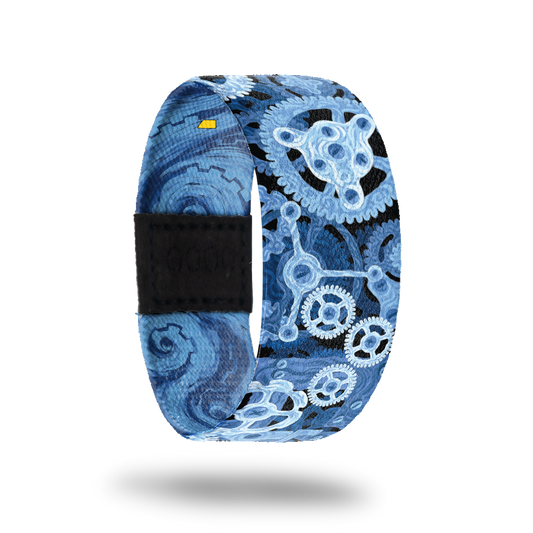 This is a reward item, do not purchase. The strap design is blue clock gears working together. The inside is blue swirls and reads Make It Work. This comes with a matching lapel pin. 