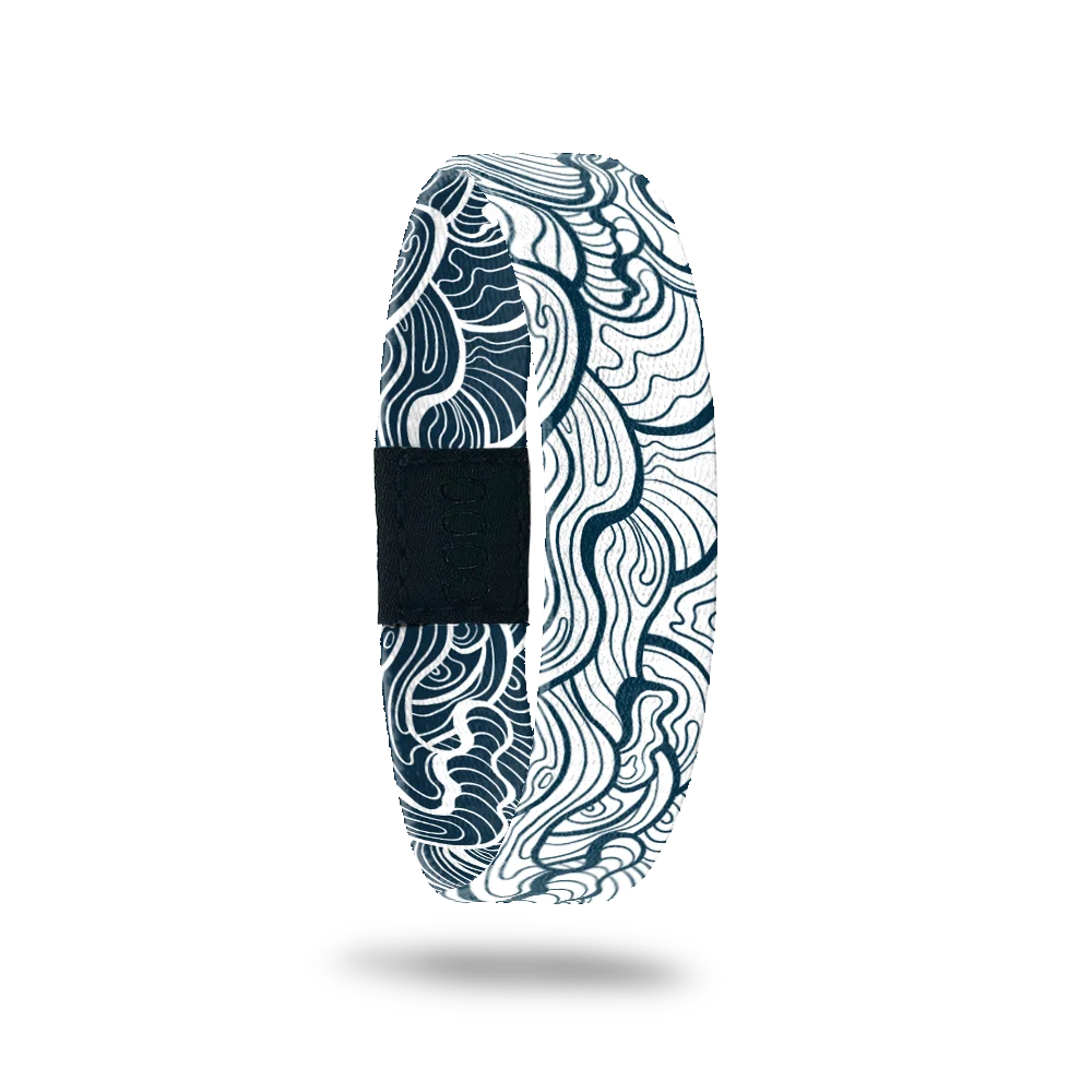 White with dark blue/teal abstract waves. 