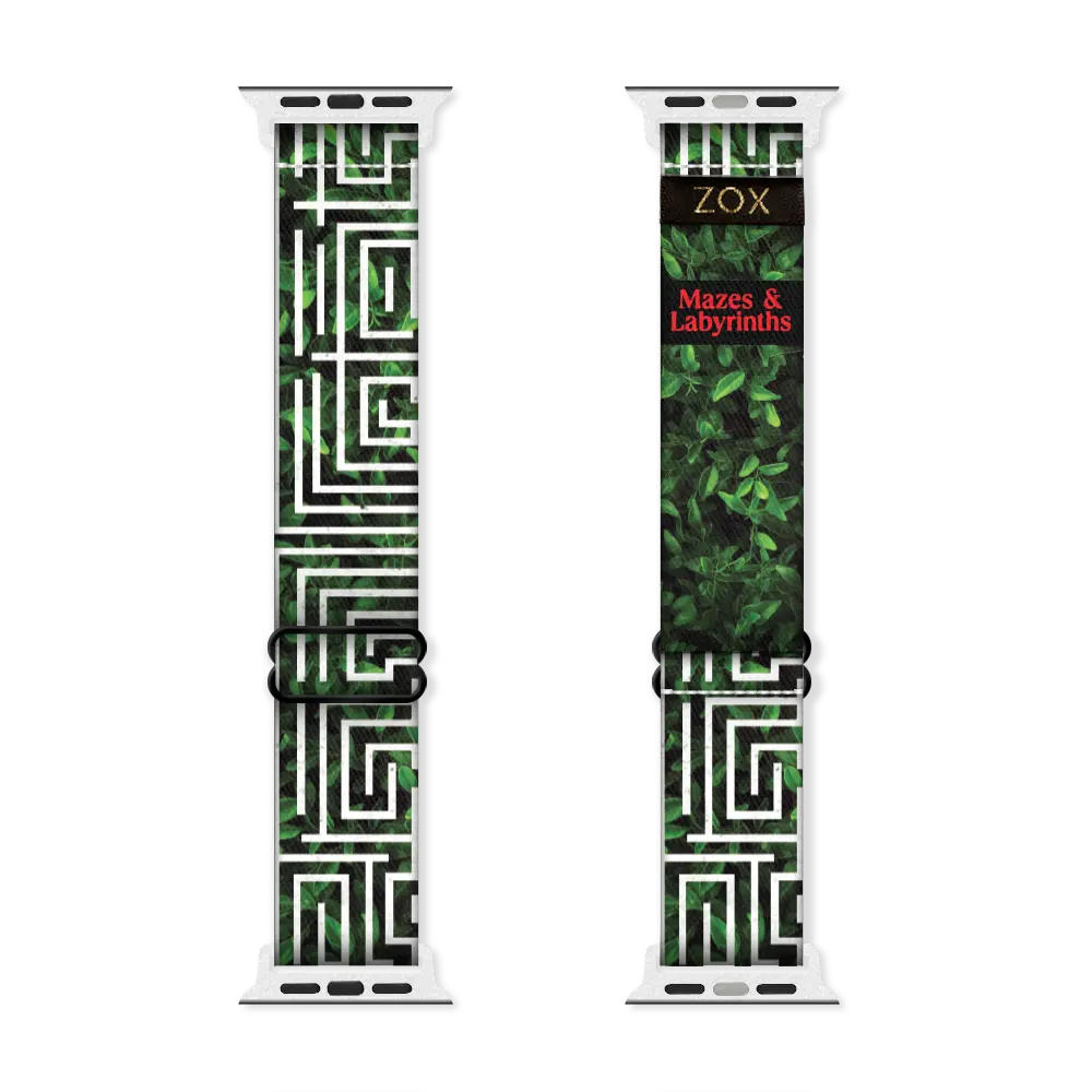 Watchband with a dark forest green base of heavy vines/trees/leaves. The design on top is white angles to represent a maze. The inside is the same and reads Mazes & Labyrinths. Check out size guide for compatible watches. 