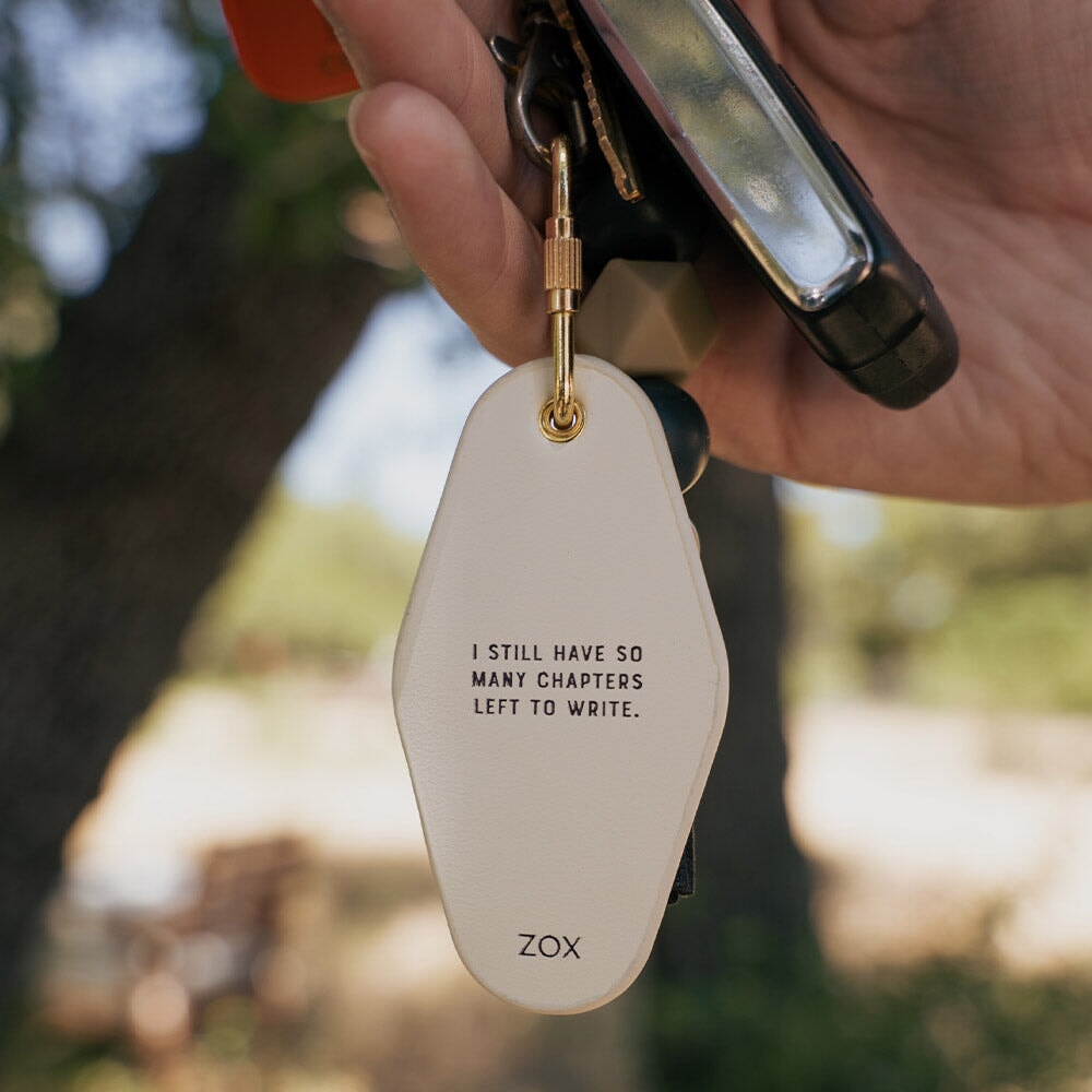 My Story Isn't Finished Leather Keychain