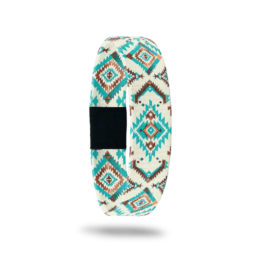 Take The Long Way bracelet showing a southwestern diamond pattern in turquoise and rust on cream