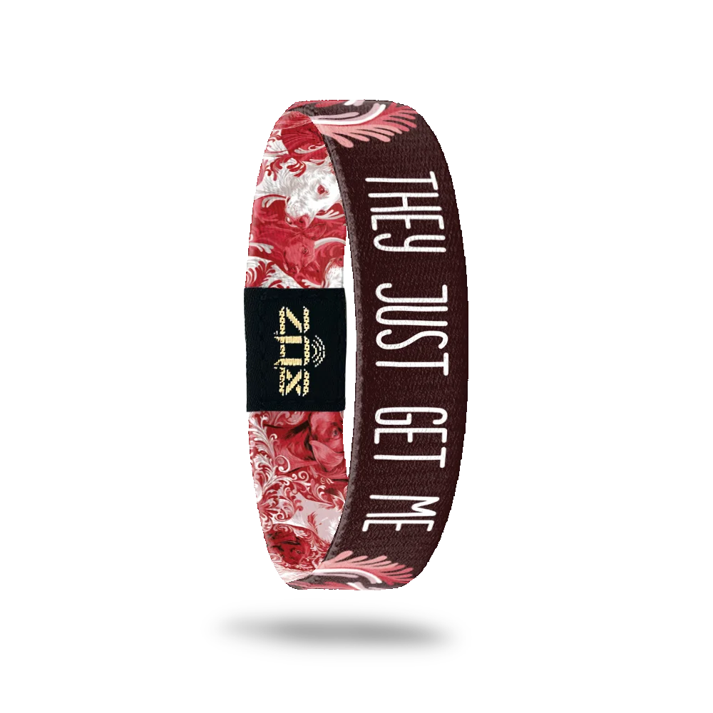Inside of the They Just Get Me bracelet, with the words They Just Get Me across the red and white dog print