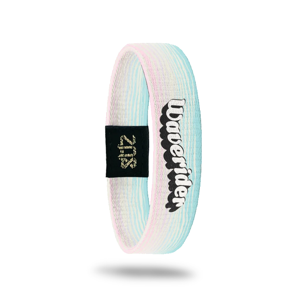 Product photo of the inside of the Waverider bracelet, continuing the pastel blue and pink gradient. Bold, retro-style white text outlined in black reads "Waverider" vertically along the single. A black patch with a gold "ZOX" logo is also visible.