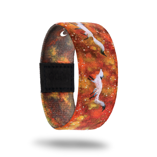 This is a reward item and not purchasable. The design is orange and red nebula with white foxes running along the strap. The inside is the same and reads Courageous. This is the moonstone for the Series 1 collection. 