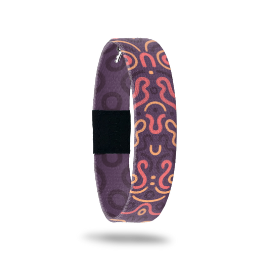 Dark purple with pink and orange swirls and dots. Inside is dark purple with a darker purple circles all over and says Failure =/= Defeat 