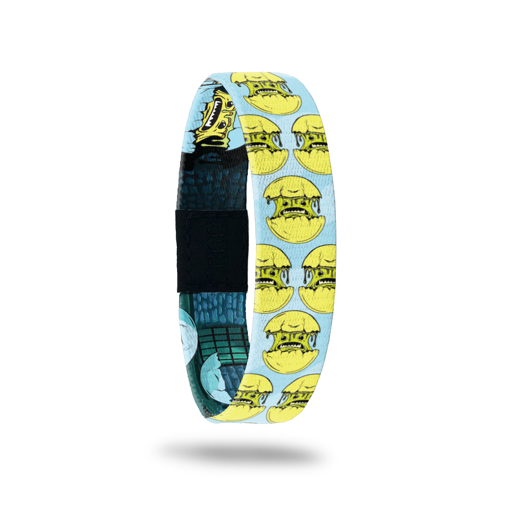 Product photo of the outside of 2020 - Day 1 - Mr. Oh My Gosh: light blue design with repeating green monsters coming out of a yellow shell