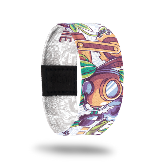 Outside design of elastic wristband called There Can Only Be One. The design is a bunch of random items such as a helmet, a plant, gears, a hat, coils and other items. The colors are mainly orange, green, and purple