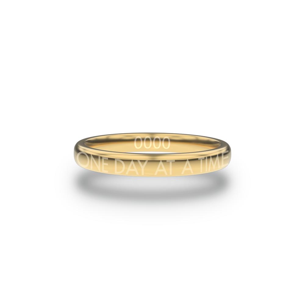 Front design of One Day At A Time gold ring with sketched in text ‘One Day At A Time’