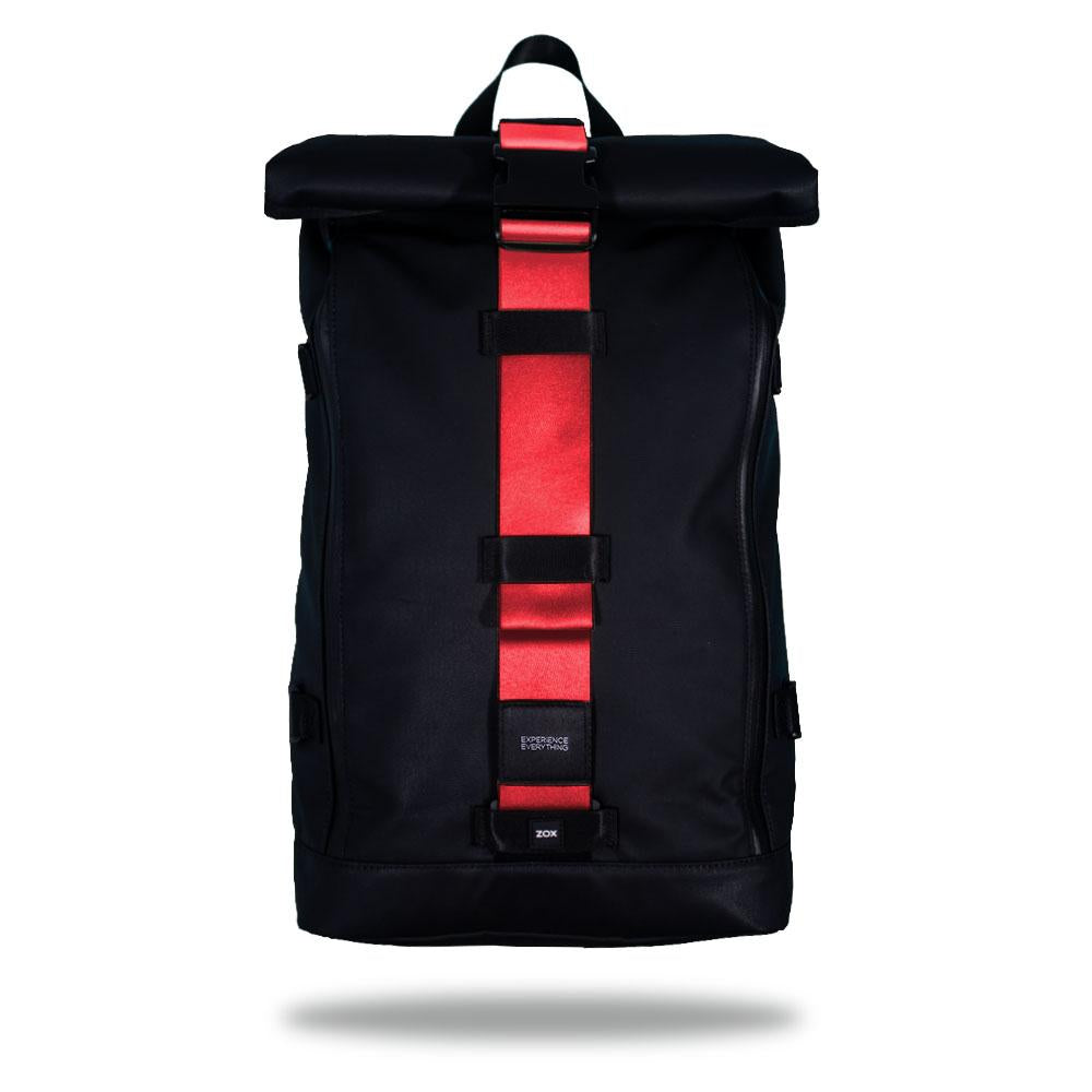 Product image of an Imperial backpack showing a wide strap down the center of it that is interchangeable. The closure strap the item that is for sale on this page and is called Grapefruit and is a solid red with orange undertones color