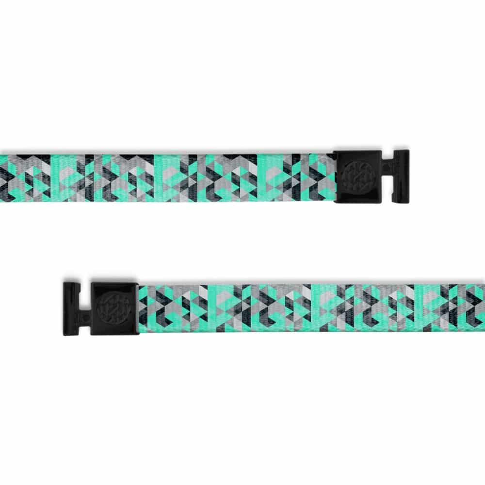 A product image of a wide and flat string with black metal aglets meant to be used with the ZOX hoodie. The string is called Alpha and is a white black and light green geometric pattern